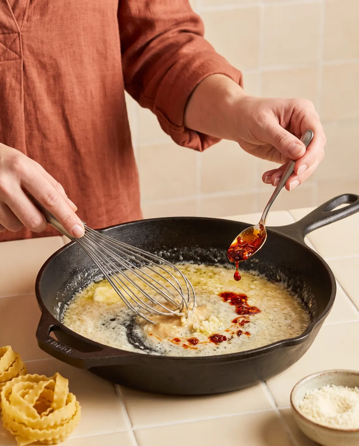 Process shot of making spicy miso butter pasta