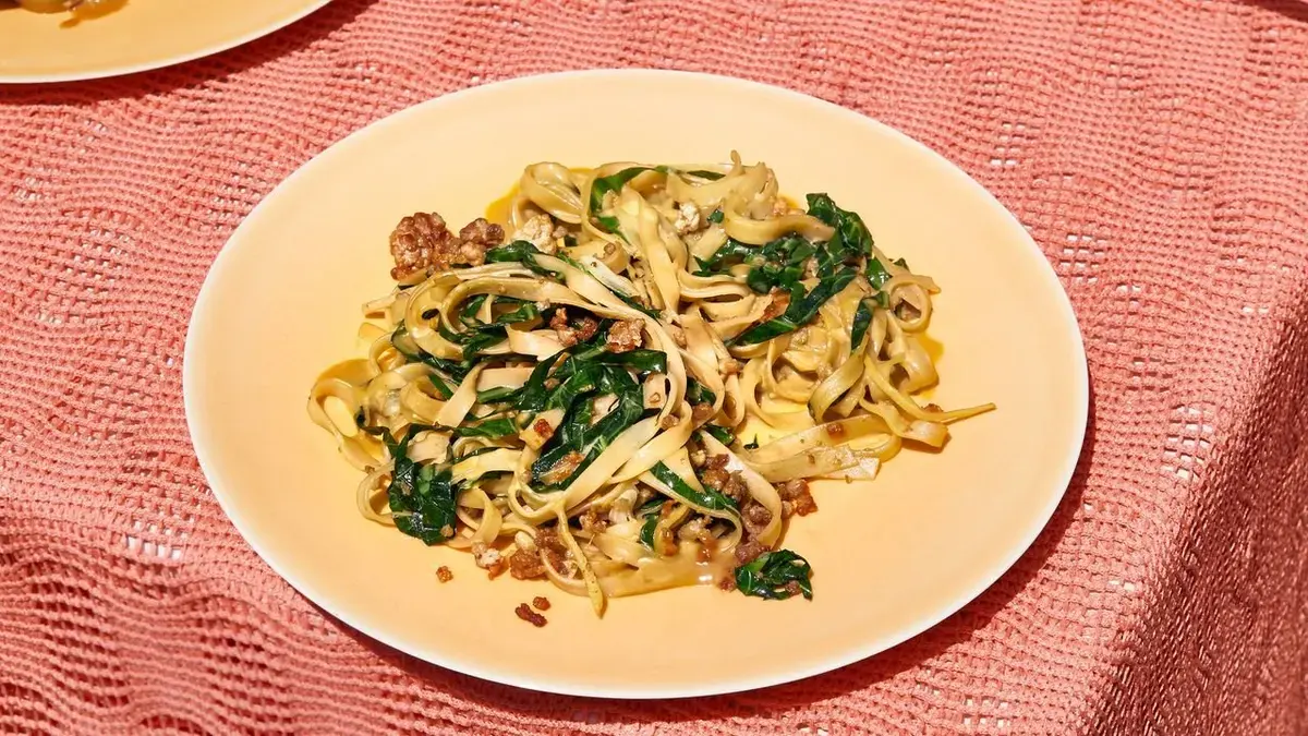 Peanut Rice Noodles with Pork and Collard Greens