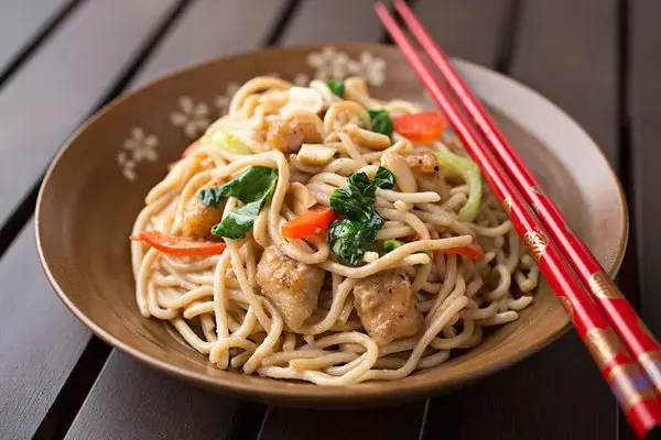 Peanut Chicken over Brown Rice Noodles