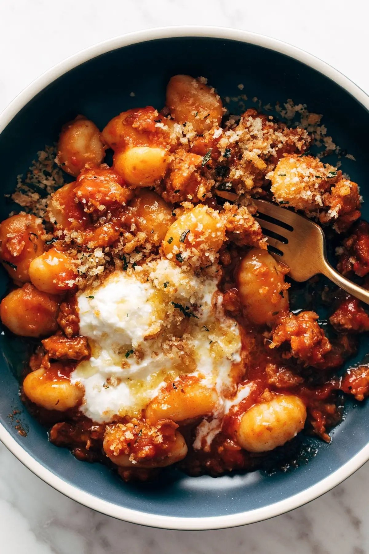Millionaire Gnocchi with Red Sauce, Herbed Ricotta, and Golden Crispies Recipe