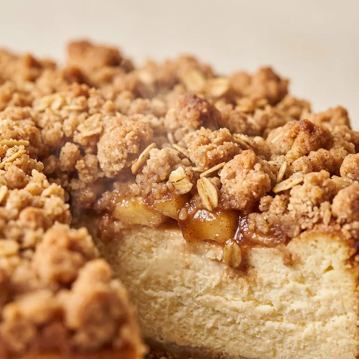 A close-up detail of Apple Crumble Cheesecake