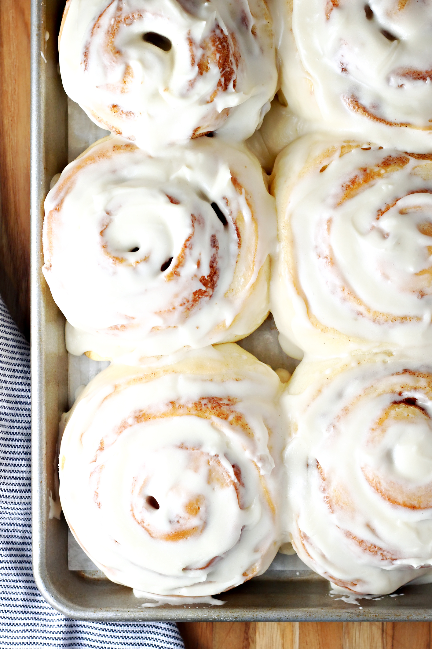 Fluffy Cinnamon Rolls With Whipped Cream Topping