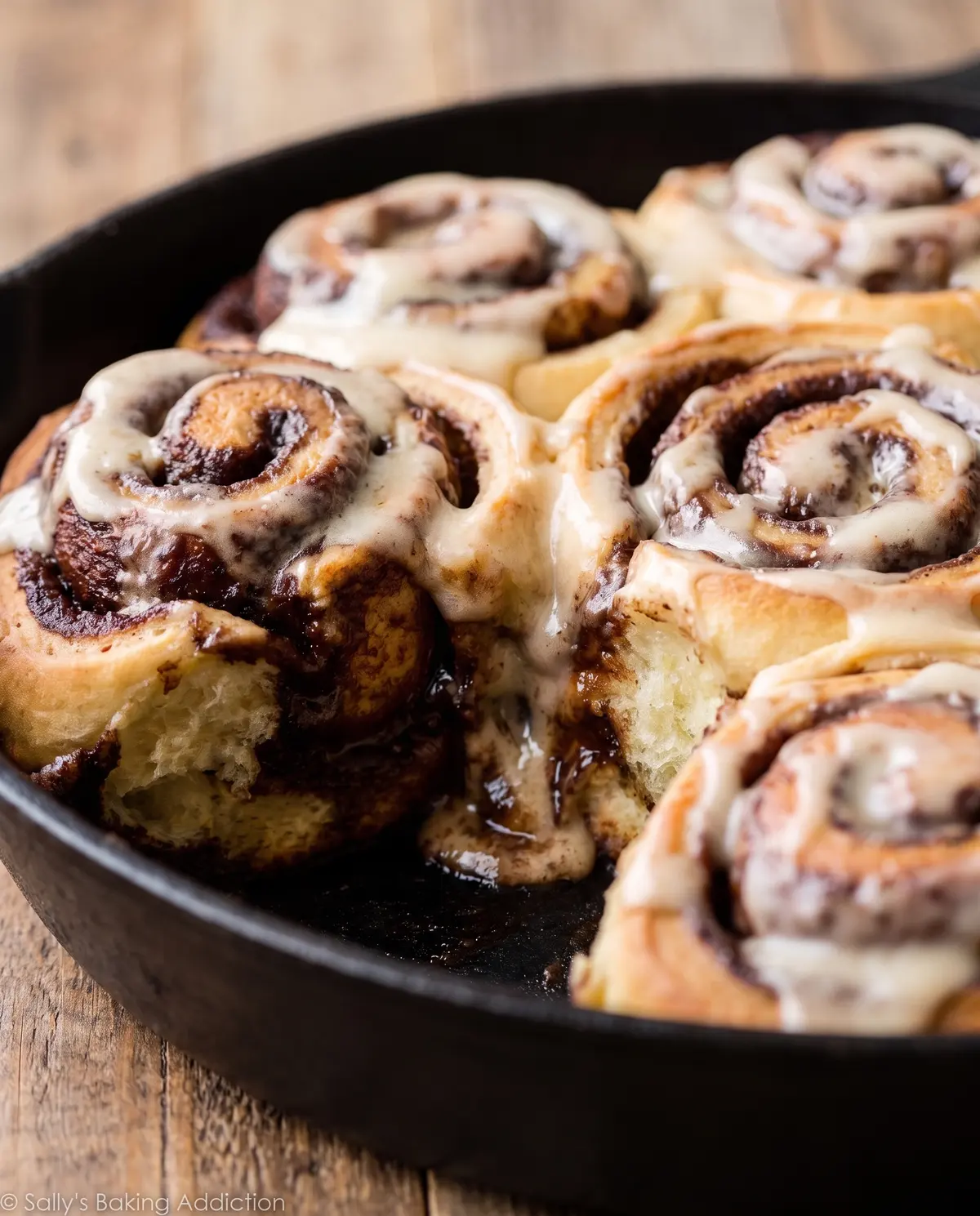 Chocolate cinnamon rolls side view showing swirled layers