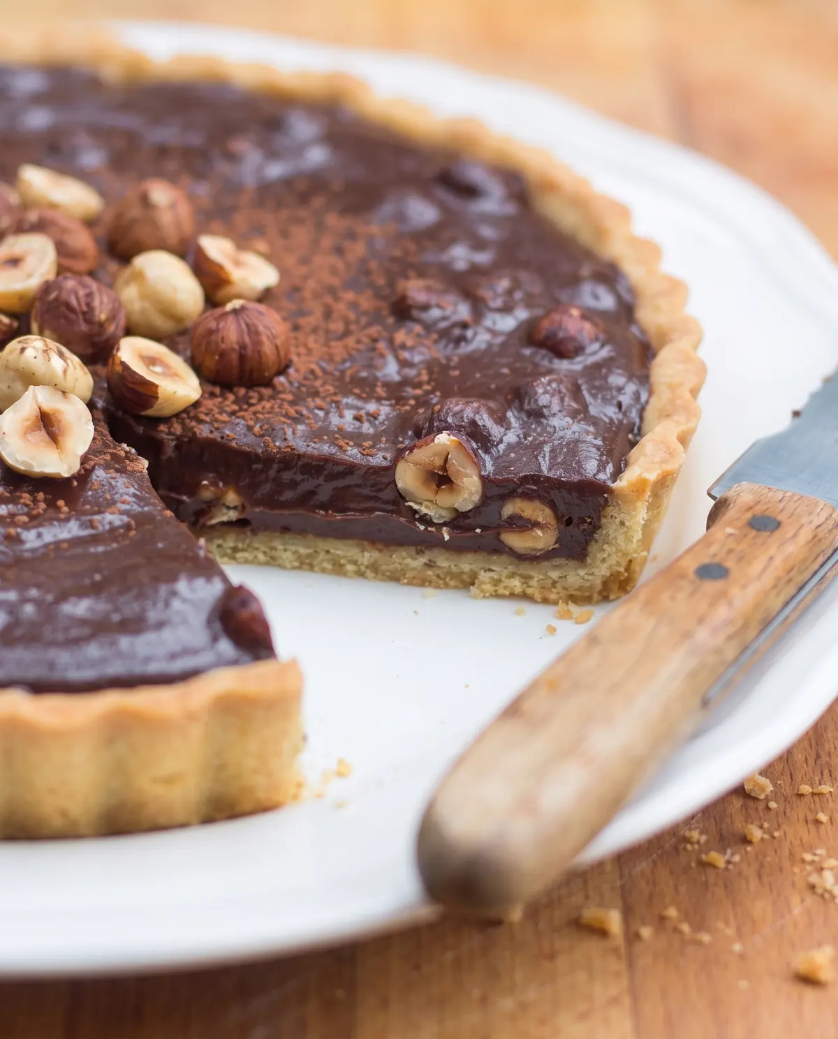 Chocolate hazelnut tart side view showing layers