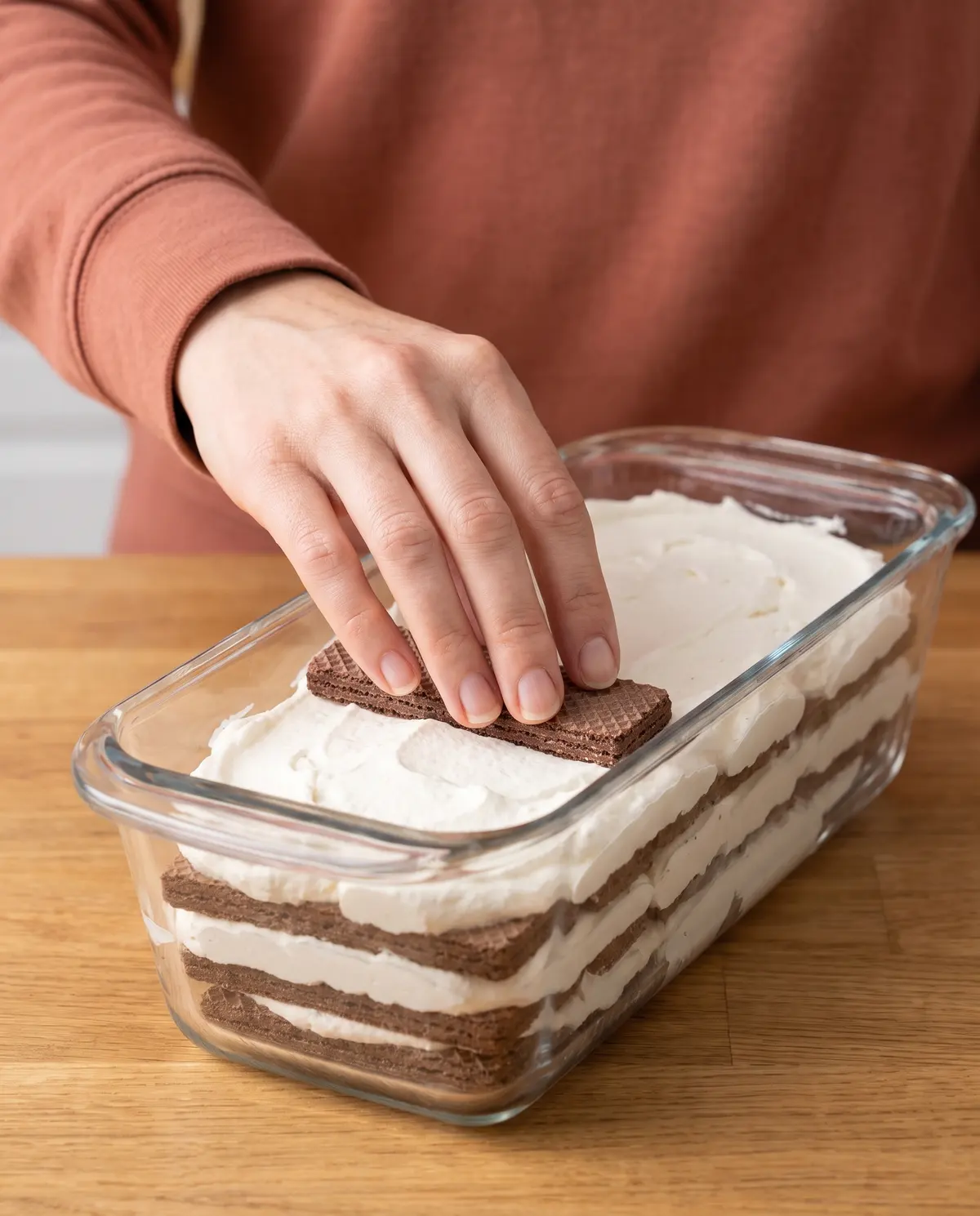 Layering cookies and cream in the pan