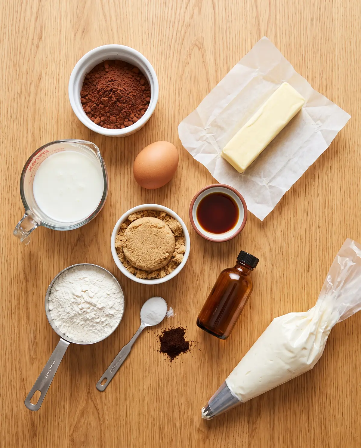 Chocolate whoopie pie ingredients laid out on a wood table